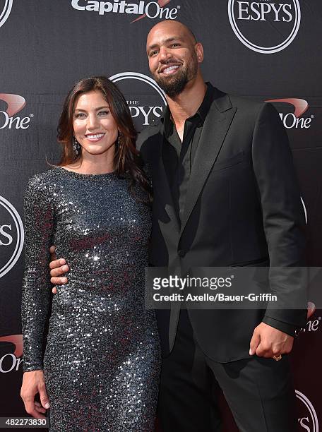 Soccer player Hope Solo and NFL player Jerramy Stevens arrive at The 2015 ESPYS at Microsoft Theater on July 15, 2015 in Los Angeles, California.