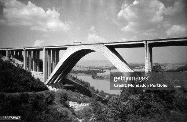 Bridge on the river Tiber along the Autostrada del Sole. Italy, 1964