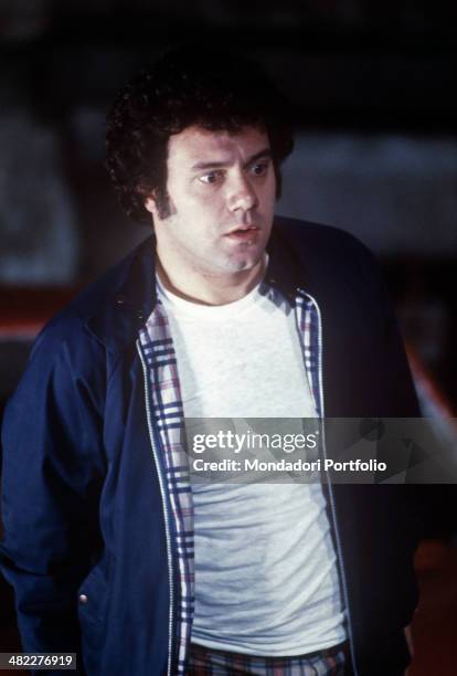 Italian actor and director Carlo Verdone playing the character Pasquale Ametrano sitting in the car in the film Bianco, rosso e Verdone. 1981