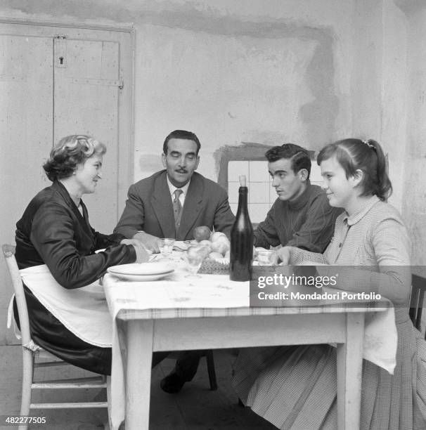 Italian football player Mario Corso sitting at the table in his family home in the district San Michele Exra in Verona, where he began his career for...