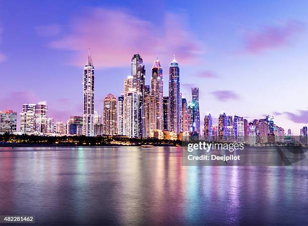 dubai marina skyline at twilight united arab emirates - dubai marina stock pictures, royalty-free photos & images
