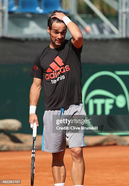 Fabio Fognini of Italy shows his frustrations during a practice session prior to the Davis Cup World Group Quarter Final match between Italy and...