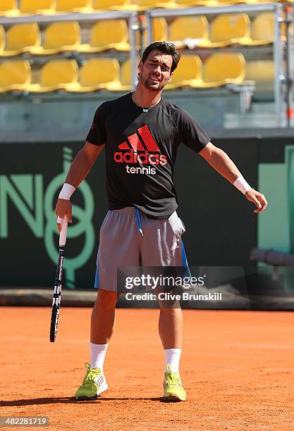 Fabio Fognini of Italy shows his frustrations during a practice session prior to the Davis Cup World Group Quarter Final match between Italy and...