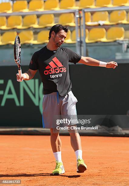 Fabio Fognini of Italy shows his frustrations during a practice session prior to the Davis Cup World Group Quarter Final match between Italy and...