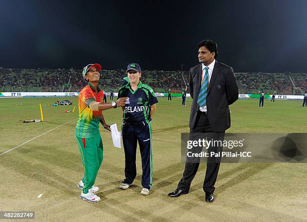 Salma Khatun captain of Bangladesh , Isobel Joyce captain of Ireland and ICC match referee Javagal Srinath during the toss before the start of the...