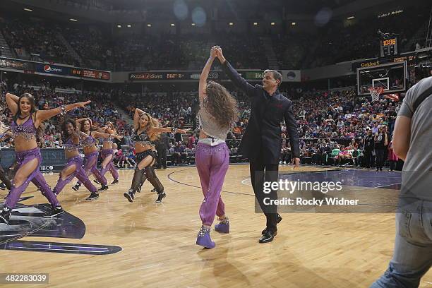 Sacramento Kings owner Vivek Ranadive and his daughter, Anjali Ranadive, entertain the fans during halftime of the Los Angeles Lakers against the...