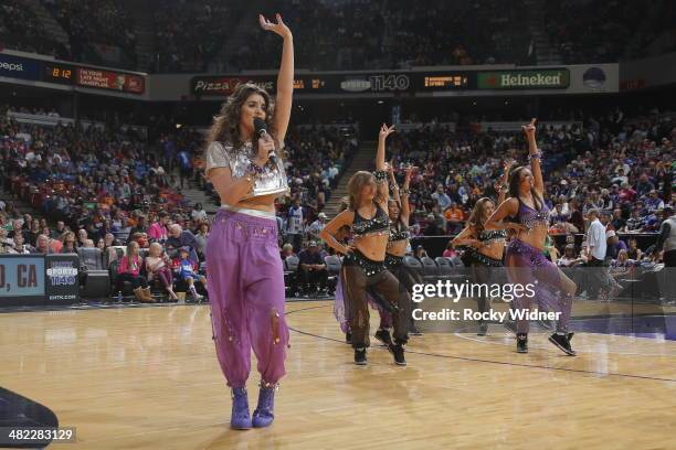 The daughter of Sacramento Kings owner Vivek Ranadive, Anjali Ranadive, entertains the fans during halftime of the Los Angeles Lakers against the...