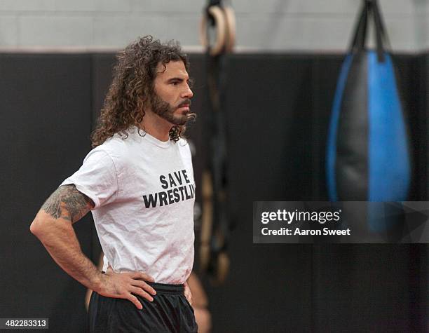 Featherweight contender Clay Guida looks to the mat during an open training session for fans and media at the Jackson's Mixed Martial Arts and...