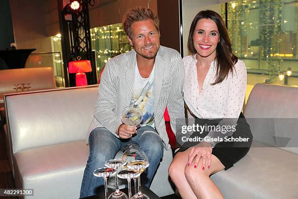 Gregor Teicher, Birgit Noessing, SKY, during the Emporio Armani & Friends event at the Armani Caffe on July 29, 2015 in Munich, Germany.