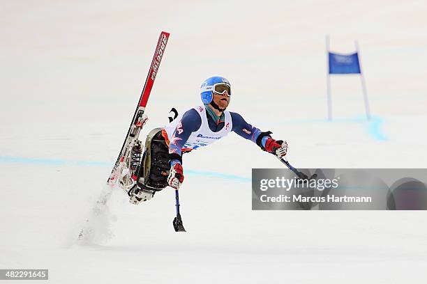 Tyler Walker of United States crashes in the Men's Downhill Sitting during day one of Sochi 2014 Paralympic Winter Games at Rosa Khutor Alpine Center...