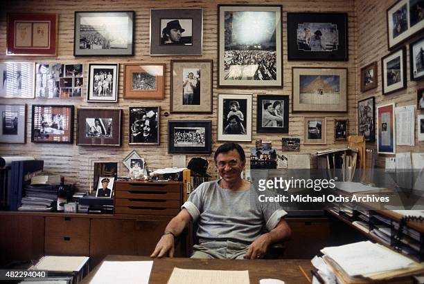 Concert promoter Bill Graham poses for a portrait in his office on April 7, 1984 in San Francisco, California.