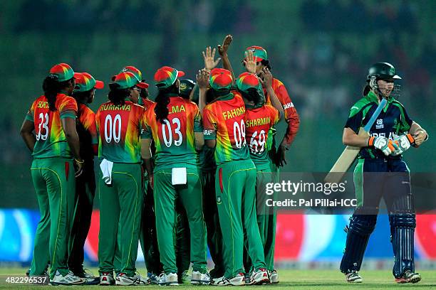 Team Bangladesh celebrates the wicket of Clare Shillington of Ireland during the ICC Women's World Twenty20 9th/10th Ranking match between Bangladesh...