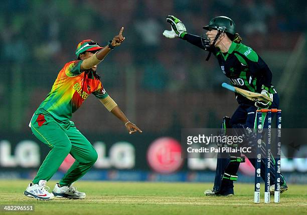 Salma Khatun captain of Bangladesh appeals successfully for the wicket of Isobel Joyce captain of Ireland during the ICC Women's World Twenty20...