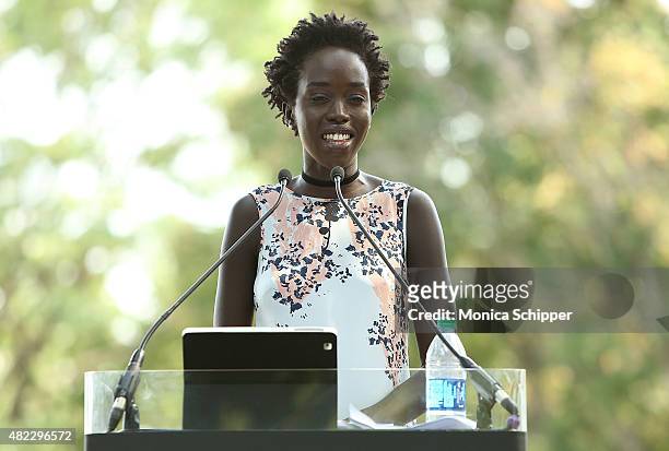 Kuoth Wiel speaks at the Amnesty International Tapestry Honoring John Lennon Unveiling at Ellis Island on July 29, 2015 in New York City.