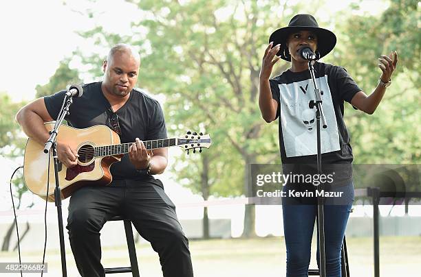 Performs at the Amnesty International Tapestry Honoring John Lennon Unveiling at Ellis Island on July 29, 2015 in New York City.