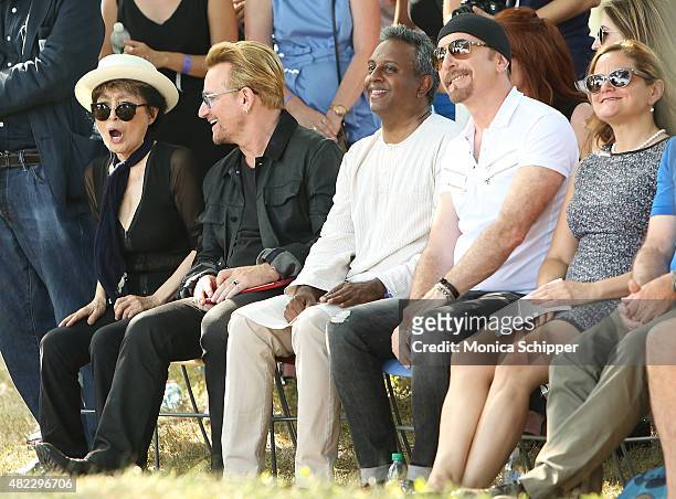 Yoko Ono, Bono, Salil Shetty, The Edge and Melissa Mark-Viverito attend the Amnesty International Tapestry Honoring John Lennon Unveiling at Ellis...