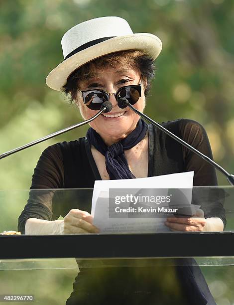 Yoko Ono speaks at Amnesty International Tapestry Honoring John Lennon Unveiling at Ellis Island on July 29, 2015 in New York City.