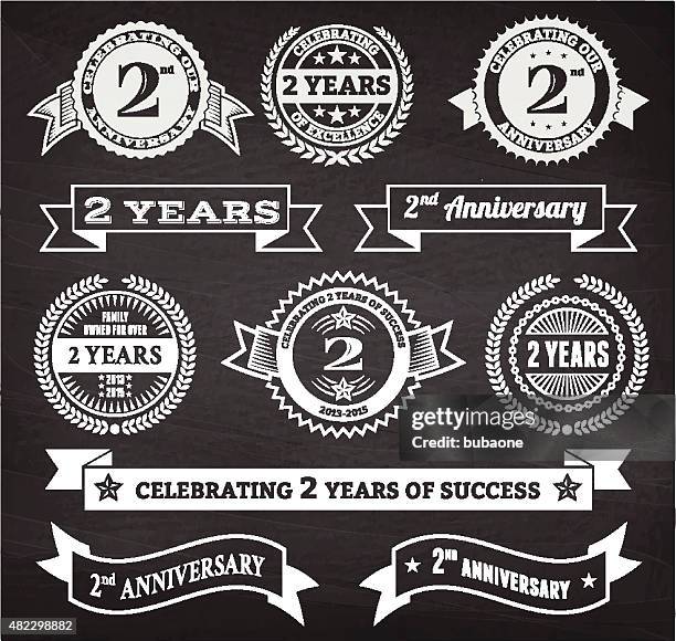 two year anniversary hand-drawn chalkboard royalty free vector background - 2nd anniversary stock illustrations