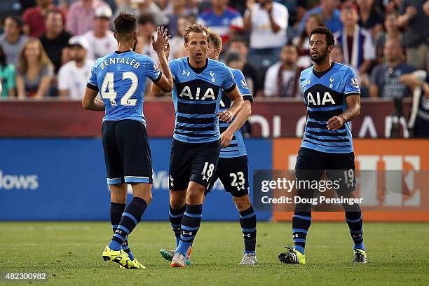 Harry Kane of Tottenham Hotspur celebrates his goal in the 37th minute against the MLS All-Stars with teammates Nabil Bentaleb, Christian Eriksen and...