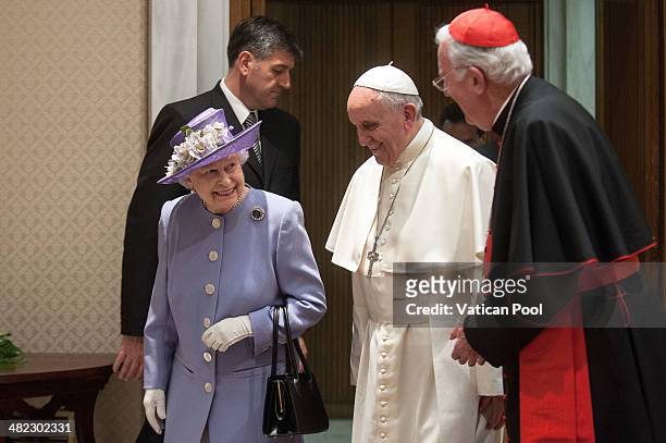 Queen Elizabeth II meets Pope Francis and Former Archbishop of Westminster Cardinal Cormack Murphy O'Connor at the Paul VI Hall on April 3, 2014 in...