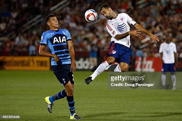 Juninho of MLS All-Stars heads the ball away from Dele Alli of Tottenham Hotspur during the 2015 AT&T Major League Soccer All-Star game at Dick's...