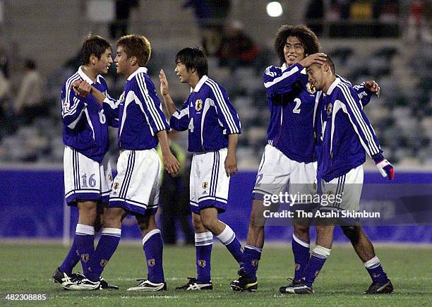 Koji Nakata, Junichi Inamoto, Masashi Motoyama, Yuji Nakazawa and Naohiro Takahara of Japan celebrate the win after the Sydney Olympics Men's...