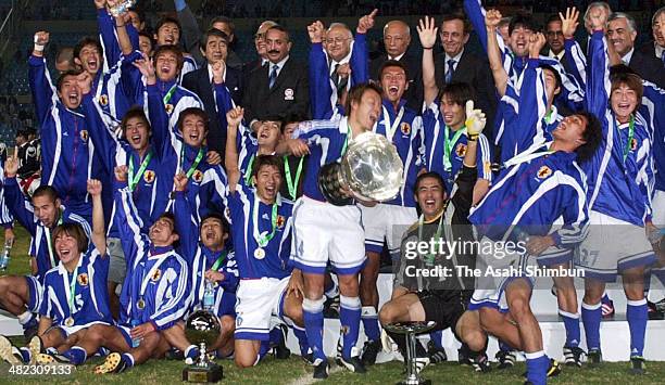 Captain Ryuzo Morioka and players of Japan celebrate winning the AFC Asian Cup 2000 final match between Saudi Arabia and Japan on October 29, 2000 in...