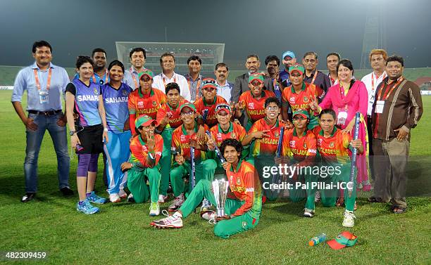 Team Bangladesh poses for a team photo with the officials after winning the ICC Women's World Twenty20 9th/10th Ranking match between Bangladesh...