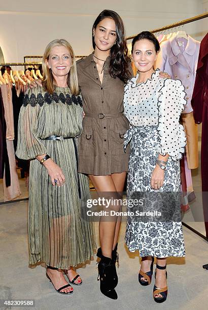 Simone Zimmermann, actress Courtney Eaton and Nicky Zimmermann attend the opening of the ZIMMERMANN Melrose Place Flagship Store hosted by Nicky and...