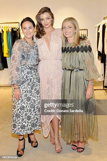 Nicky Zimmermann, model Miranda Kerr and Simone Zimmermann attend the opening of the ZIMMERMANN Melrose Place Flagship Store hosted by Nicky and...