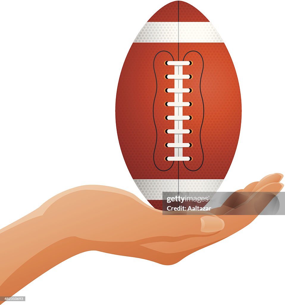 Hand Holding Football
