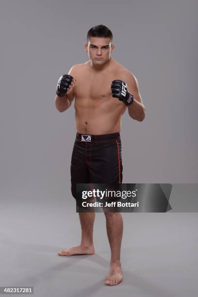 Kelvin Gastelum poses for a portrait during a UFC photo session on March 12, 2014 in Dallas, Texas.