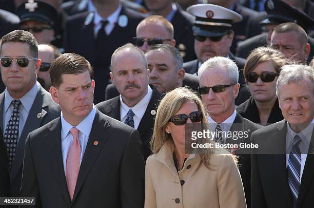 Boston Mayor Marty Walsh and Lorrie Higgins outside the church. The funeral service for Boston Firefighter Michael R. Kennedy was held at Holy Name...