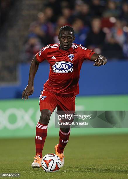 Hendry Thomas of FC Dallas handles the ball during a game between the Chivas USA and the FC Dallas at Toyota Stadium on March 22, 2014 in Frisco,...