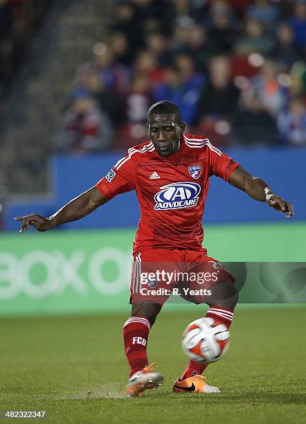 Hendry Thomas of FC Dallas kicks the ball during a game against the Chivas USA and the FC Dallas at Toyota Stadium on March 22, 2014 in Frisco, Texas.