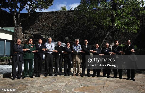 Secretary of Defense Chuck Hagel participates in the official family photo during a meeting with his counterparts from southeastern Asia, Secretary...