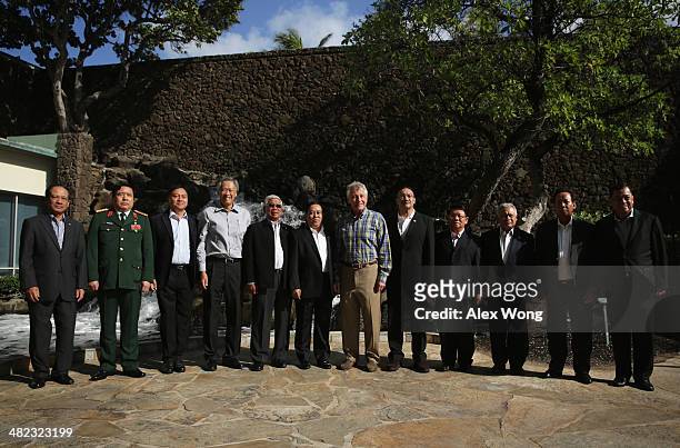 Secretary of Defense Chuck Hagel participates in the official family photo during a meeting with his counterparts from southeastern Asia, Secretary...