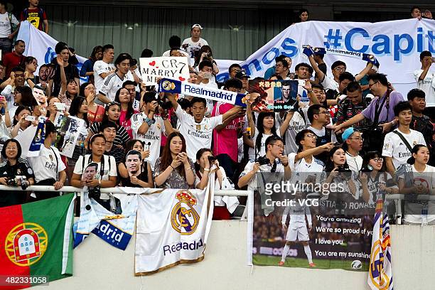 Real Madrid fans during a training session at Shanghai Stadium ahead of the International Champions Cup football match between AC Milan and Real...
