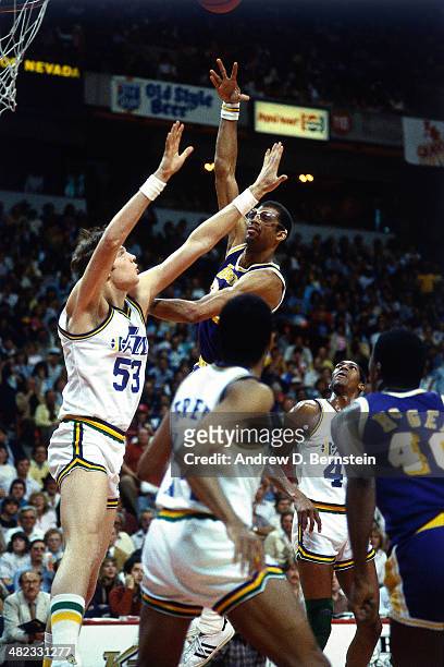 Kareem Abdul-Jabbar of the Los Angeles Lakers shoots against the Utah Jazz at the Thomas & Mack Center on April 5, 1984 in Las Vegas, Nevada. On this...