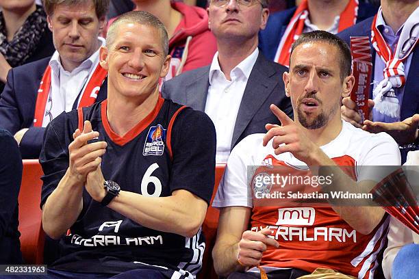 Bastian Schweinsteiger and Frank Ribery attend the 2013-2014 Turkish Airlines Euroleague Top 16 Date 13 game between FC Bayern Munich v Maccabi...