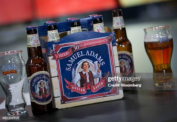 Six-pack of Boston Beer Co. Sam Adams Boston Lager sits displayed on a table during a Bloomberg Television interview in New York, U.S., on Thursday,...
