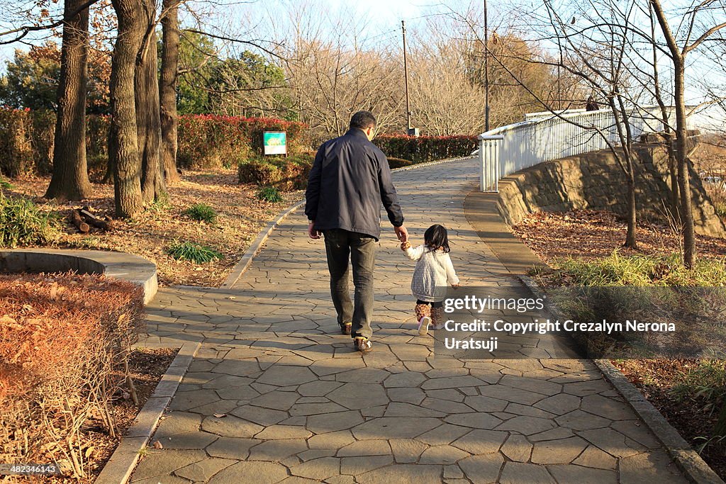 Father and Child walking