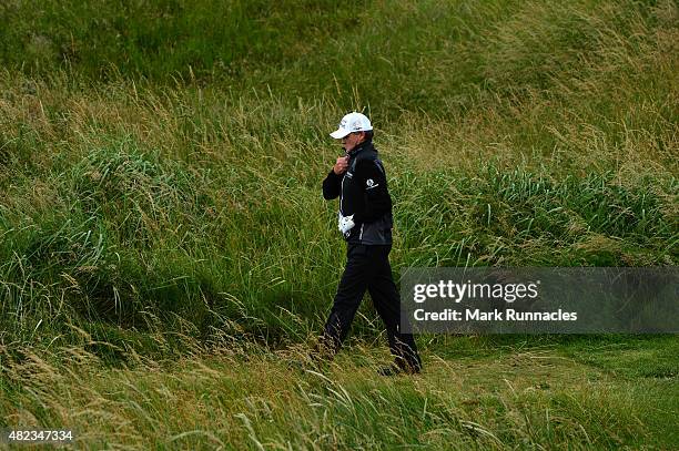 Paul Lawrie of Scotland zips up his coat as he walks to the 4th tee during the first day of the Saltire Energy Paul Lawrie Matchplay at Murcar Links...