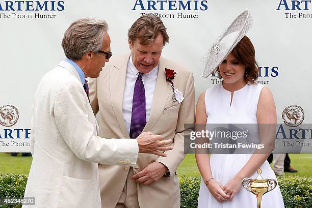 Princess Eugenie, Lord March and jeweller Theo Fennell on day three of the Qatar Goodwood Festival at Goodwood Racecourse on July 30, 2015 in...