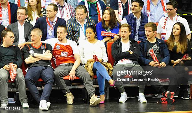 Bastian Schweinsteiger , Franck Ribery and Mario Goetze of FC Bayern Muenchen watch the Turkish Airlines Euroleague Top 16 Round 13 Group F...