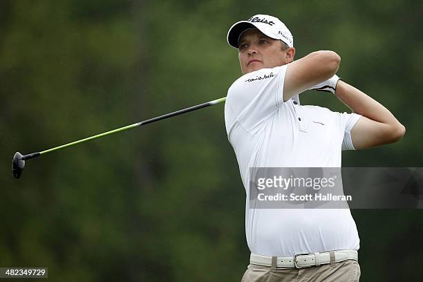 Matt Jones of Australia watches his tee shot on the third hole during round one of the Shell Houston Open at the Golf Club of Houston on April 3,...