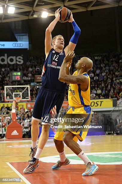 Robin Benzing, #12 of FC Bayern Munich in action during the 2013-2014 Turkish Airlines Euroleague Top 16 Date 13 game between FC Bayern Munich v...