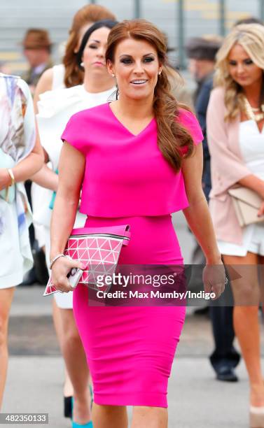 Coleen Rooney attends day 1 of the Crabbie's Grand National horse racing meet at Aintree Racecourse on April 3, 2014 in Liverpool, England.