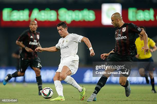 Cristiano Ronaldo of Real Madrid contests the ball against Alex Rodrigo Dias Da Costa of AC Milan during the International Champions Cup match...