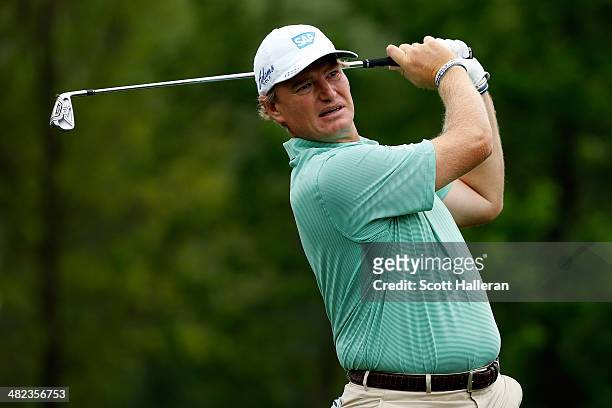 Ernie Els of South Africa watches his tee shot on the ninth hole during round one of the Shell Houston Open at the Golf Club of Houston on April 3,...